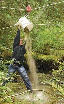 army of volunteers: Including Sea Cadets, Mayor Stewart Alsgard and MLA Nicholas Simons, all worked together to create new spawning beds for salmon in Myrtle Creek on September 11-12. (Photos by Jeremy Williams)